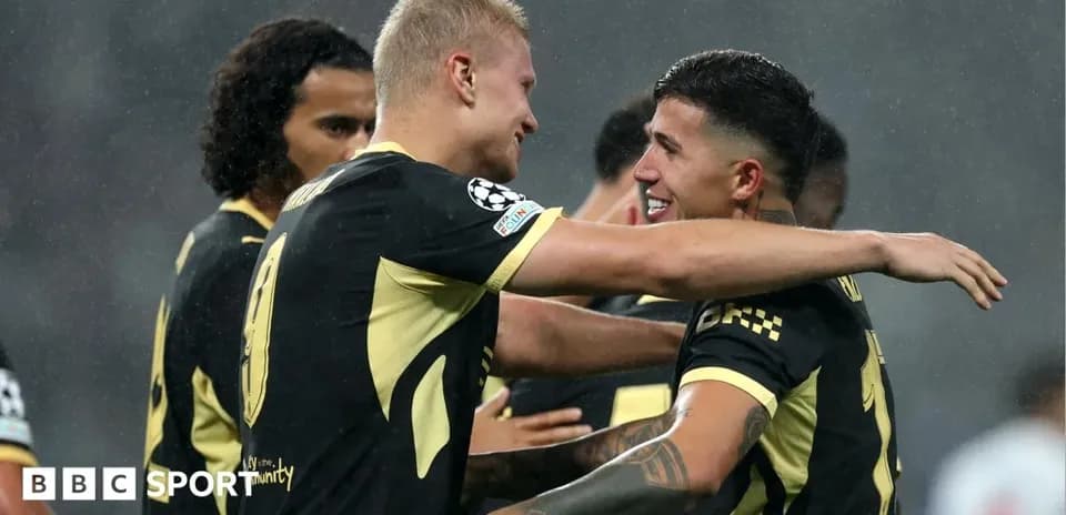 Players celebrating a goal during UEFA Champions League match