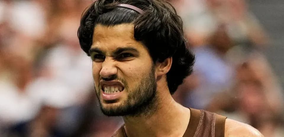 Player celebrating after winning a point in match