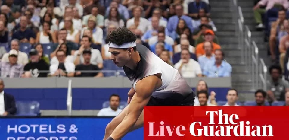 Player serving during a tennis match in stadium