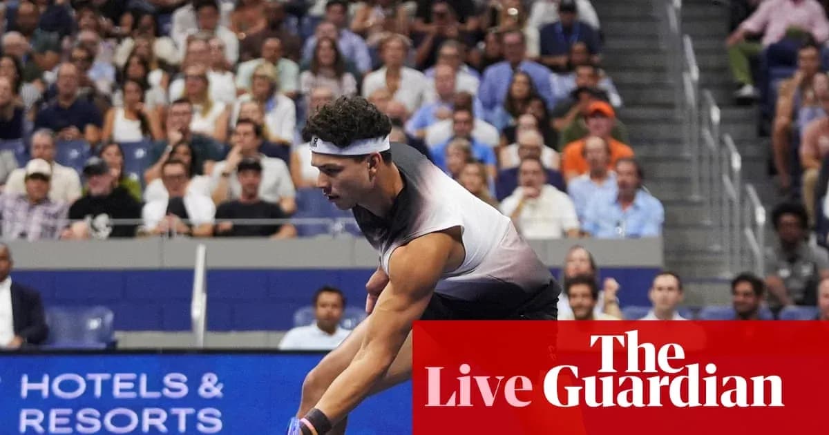 Player serving during a tennis match in stadium
