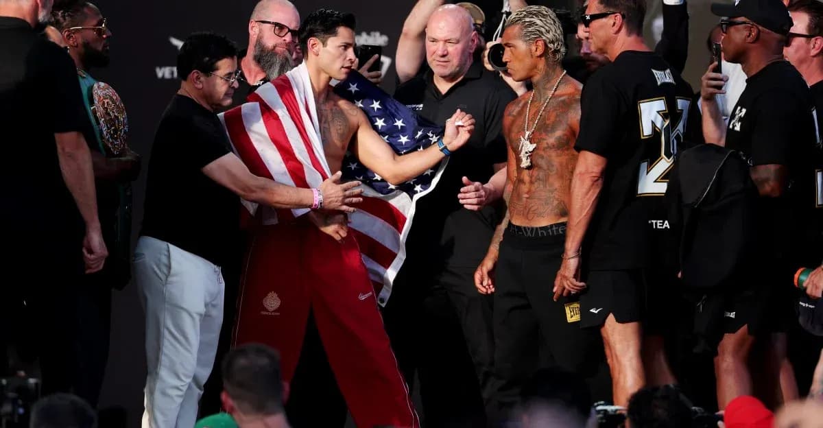 Two fighters facing off at weigh-in event