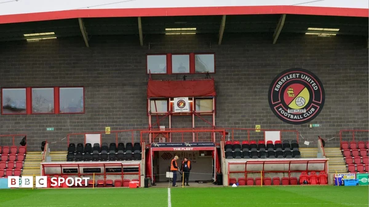 Ebbsfleet United stadium with staff near entrance