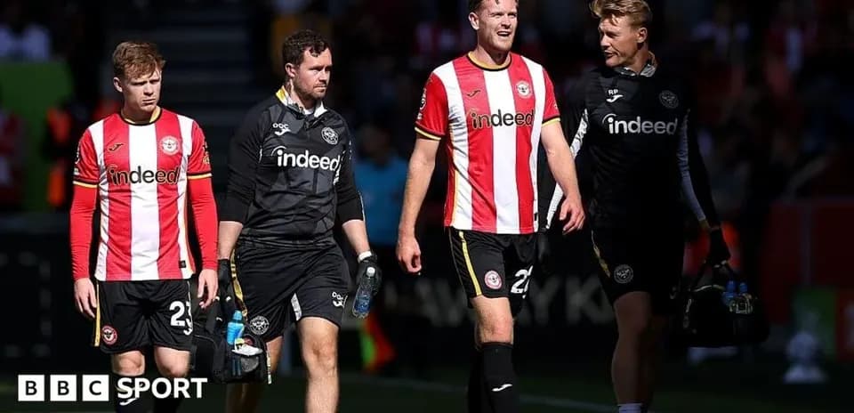 Brentford players walking off the pitch after match