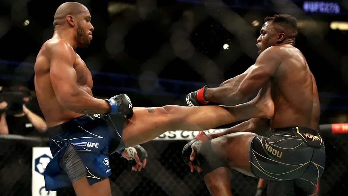 Two fighters exchanging kicks in the octagon