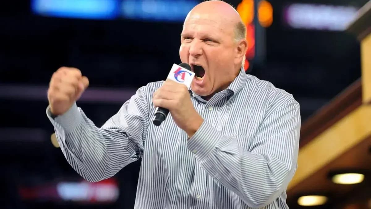 Man passionately speaking into microphone at event