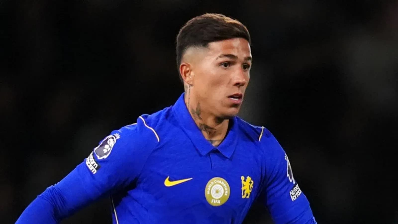 Player in blue jersey during a football match