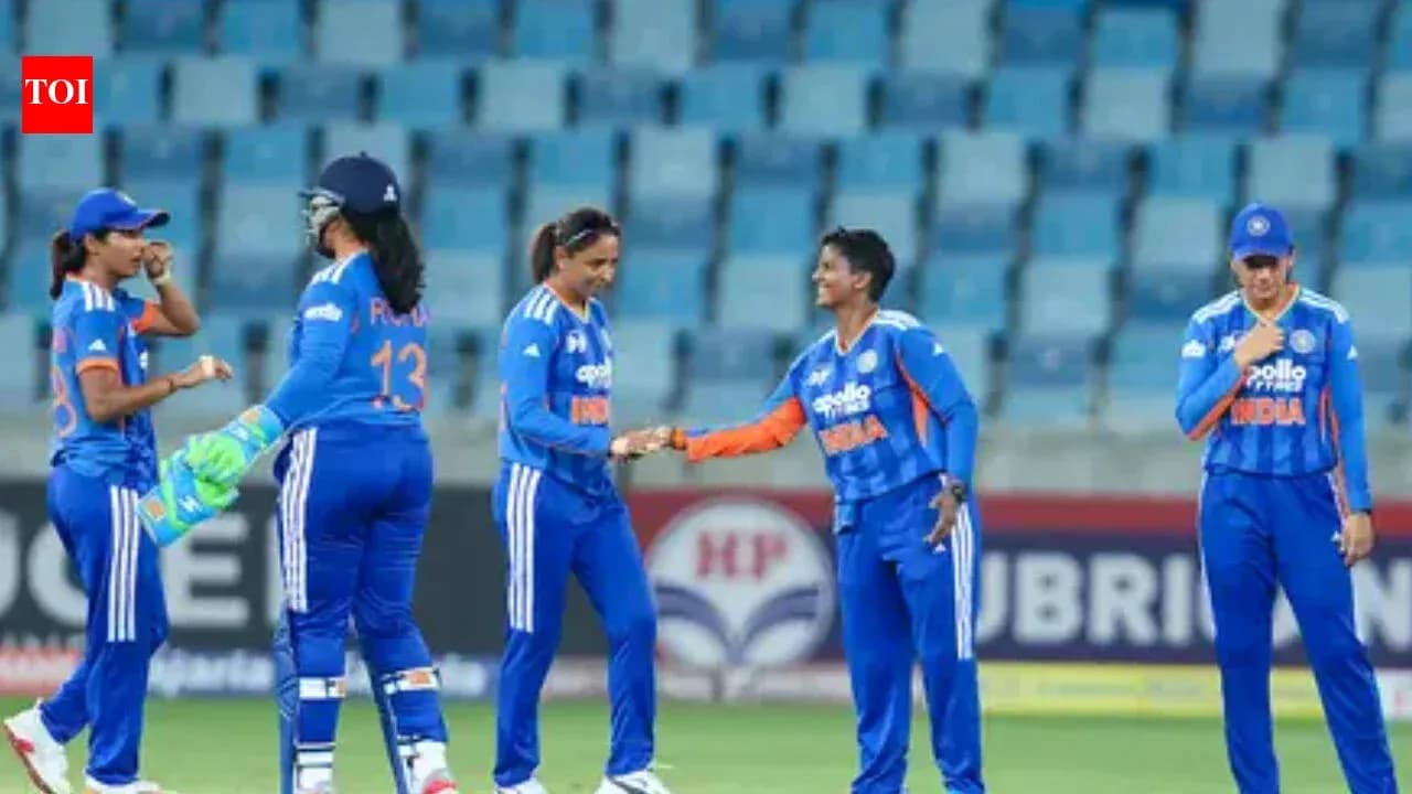 Indian women's cricket team celebrating after a wicket