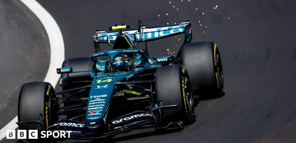 Formula 1 car racing on track with sparks flying