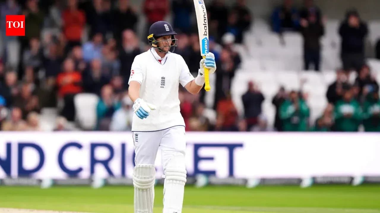 Batsman celebrating after scoring a century in cricket match