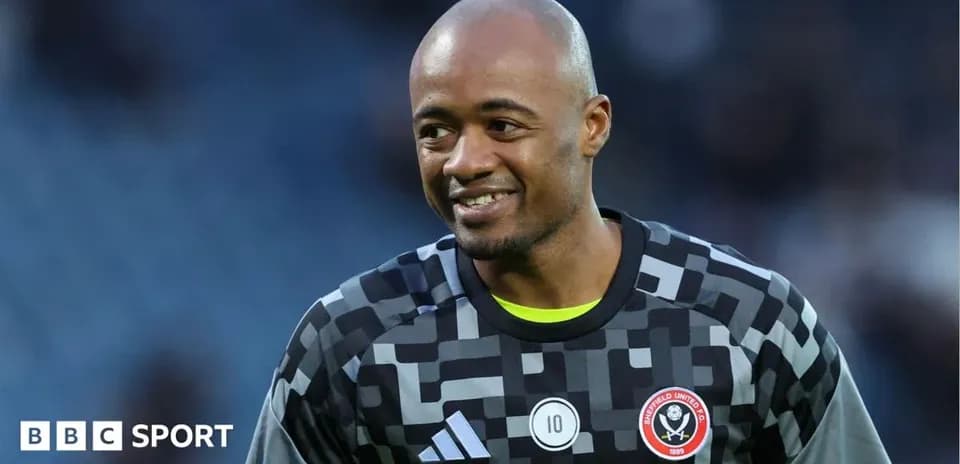 Goalkeeper smiling in Sheffield United kit