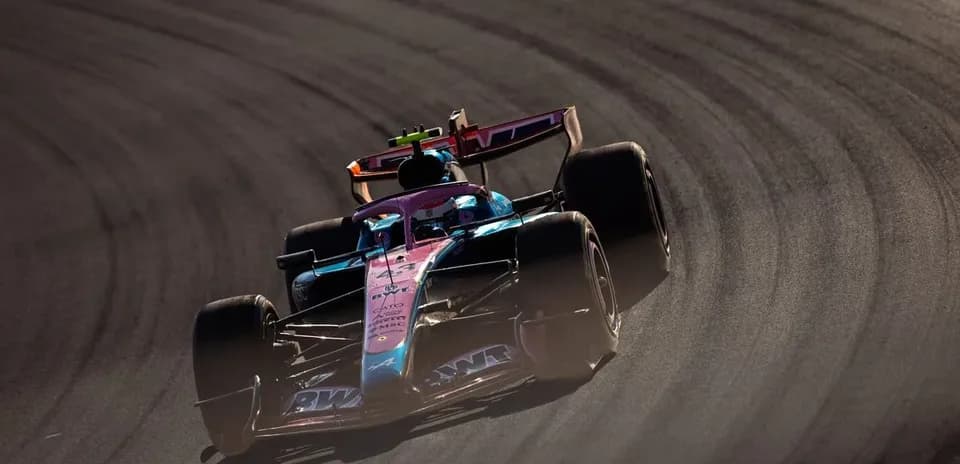 Race car navigating a curve on the track