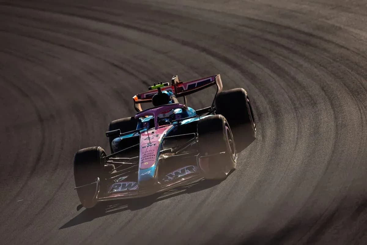 Race car navigating a curve on the track