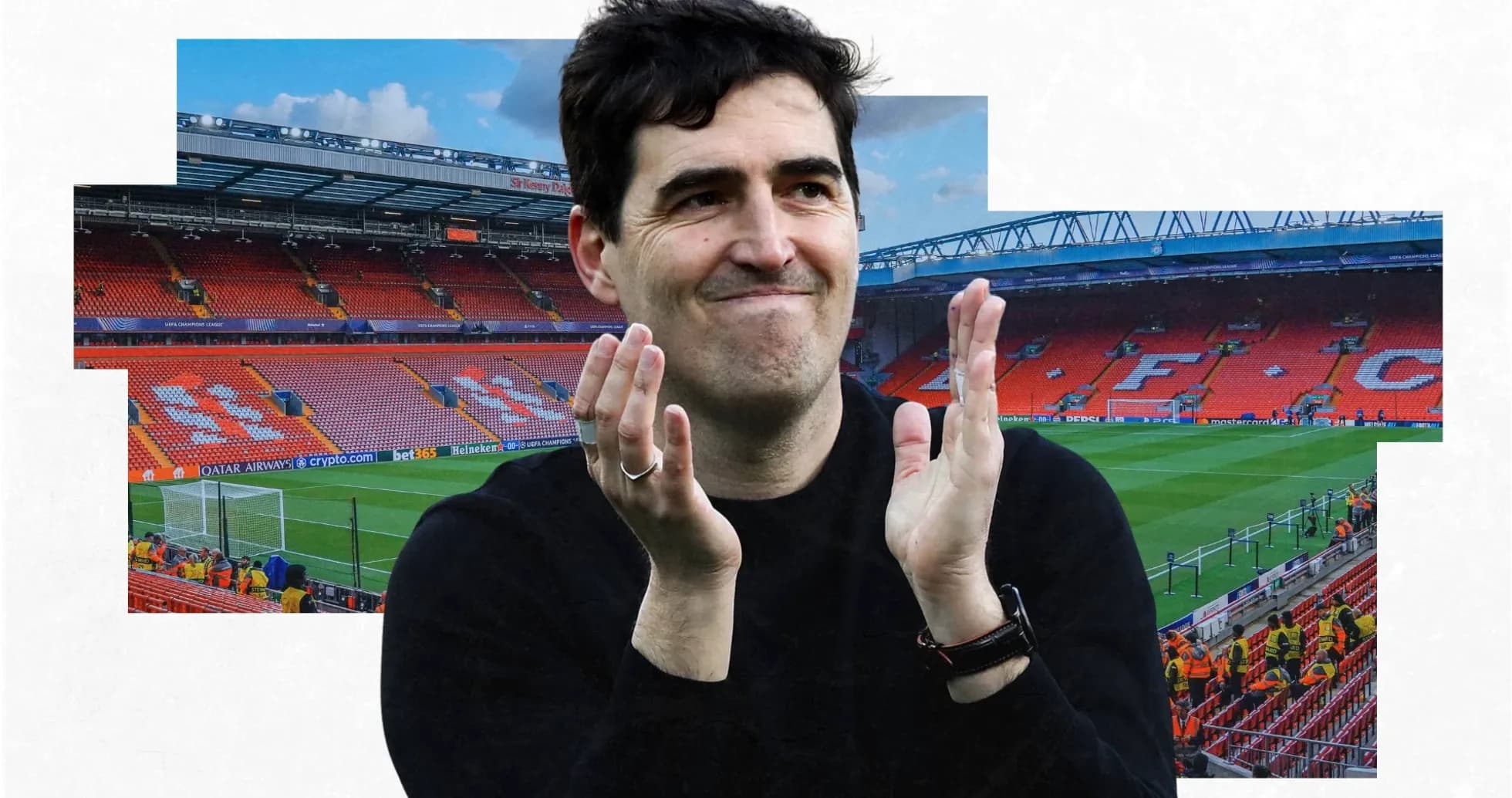 Man applauding in front of Anfield stadium seats