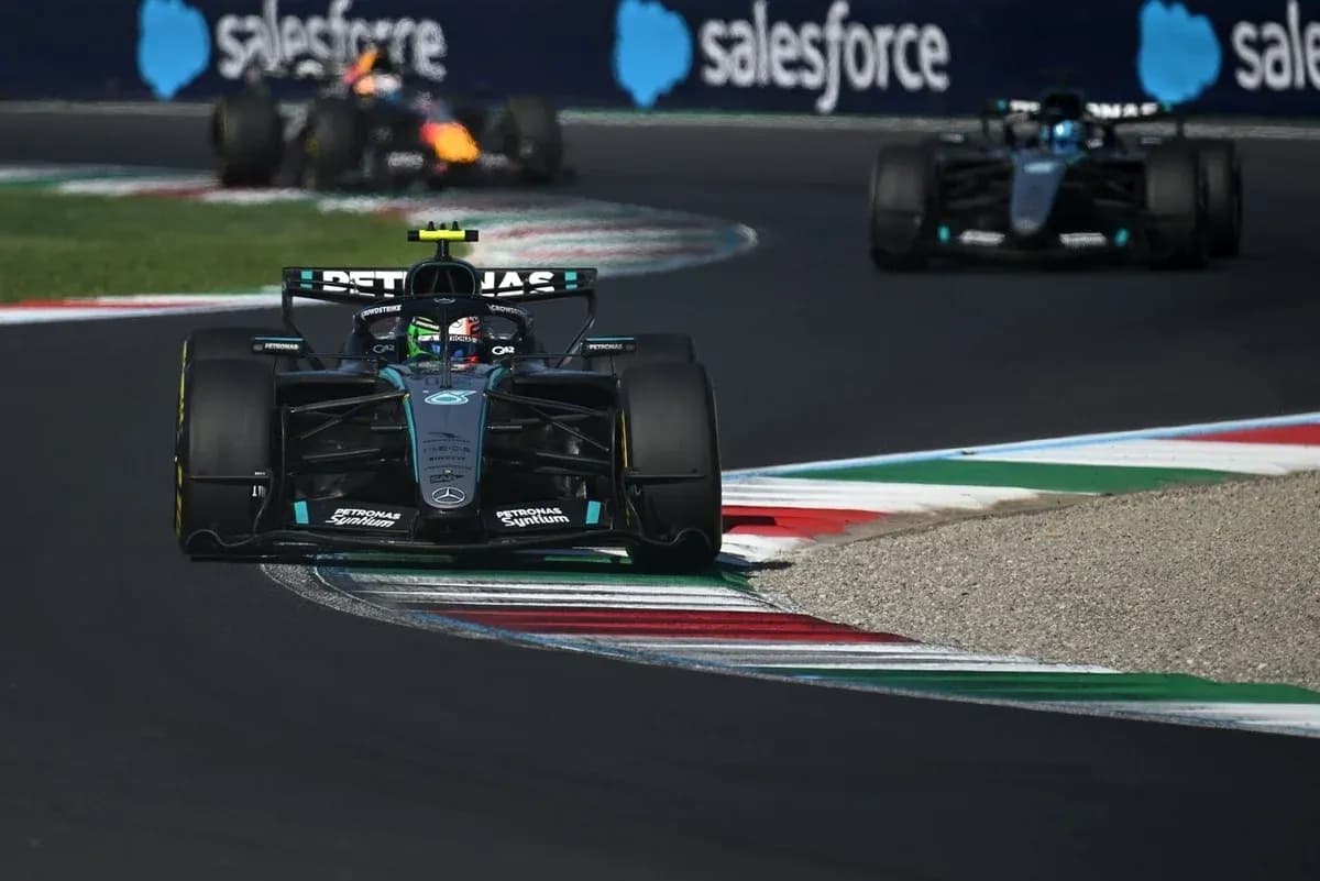 Mercedes car leading on track during Formula 1 race