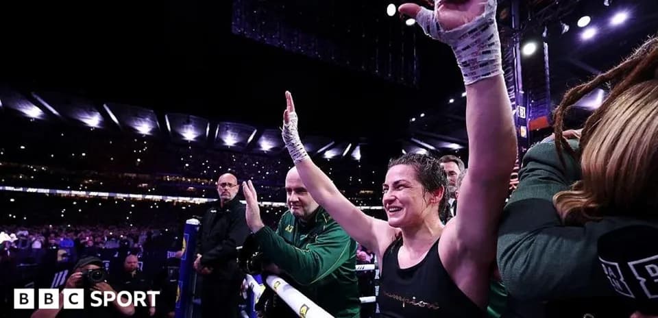 Boxer celebrating victory in the ring