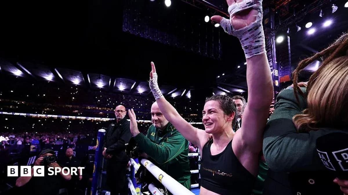 Boxer celebrating victory in the ring