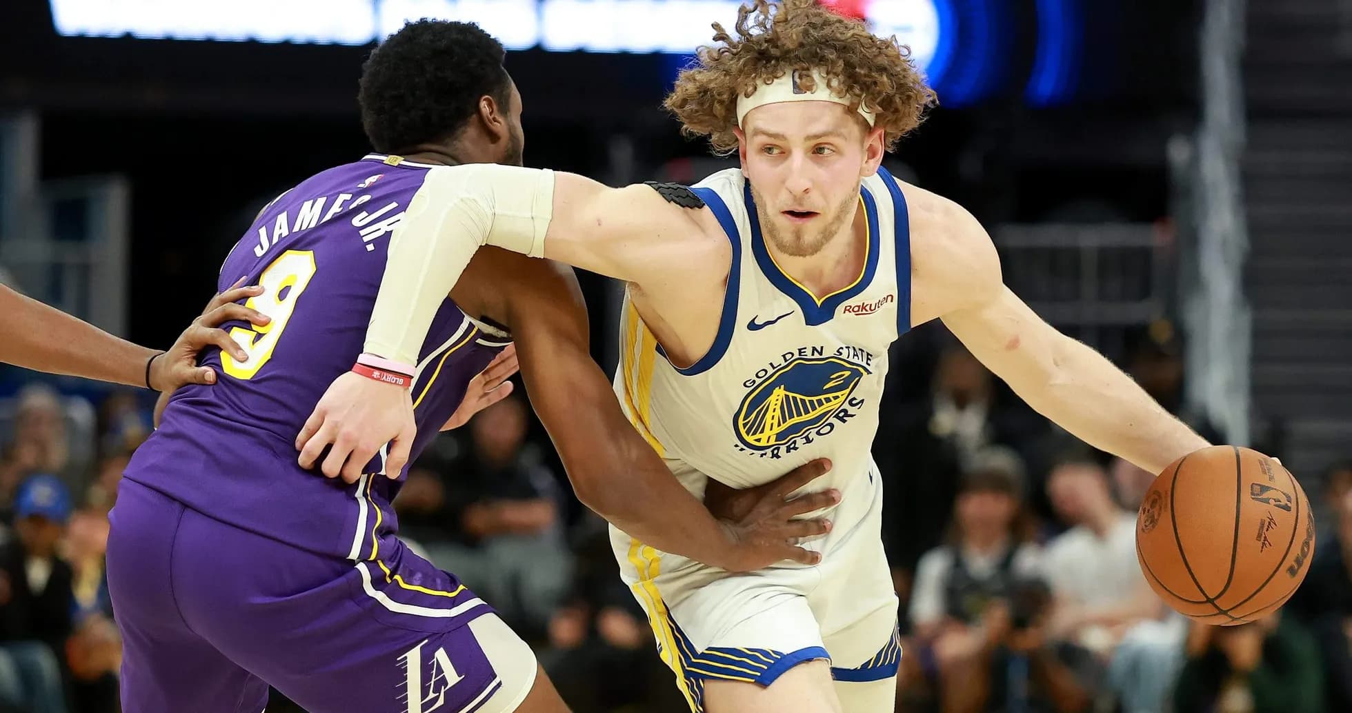 Player dribbling the ball while being guarded