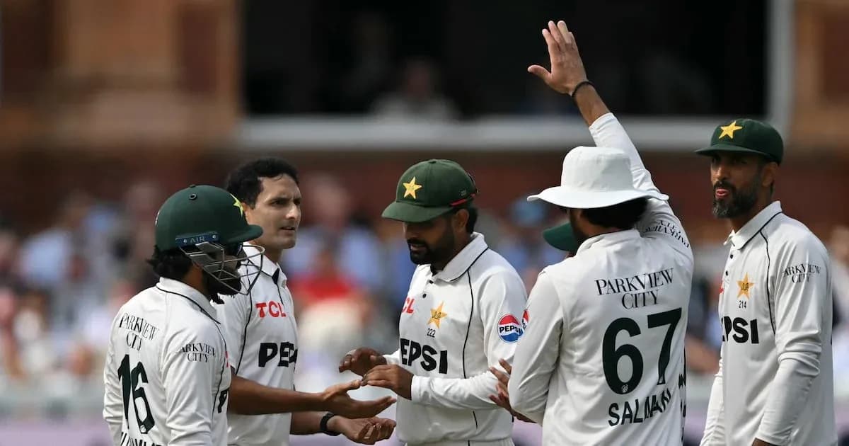 Pakistani cricket team celebrating a wicket on field