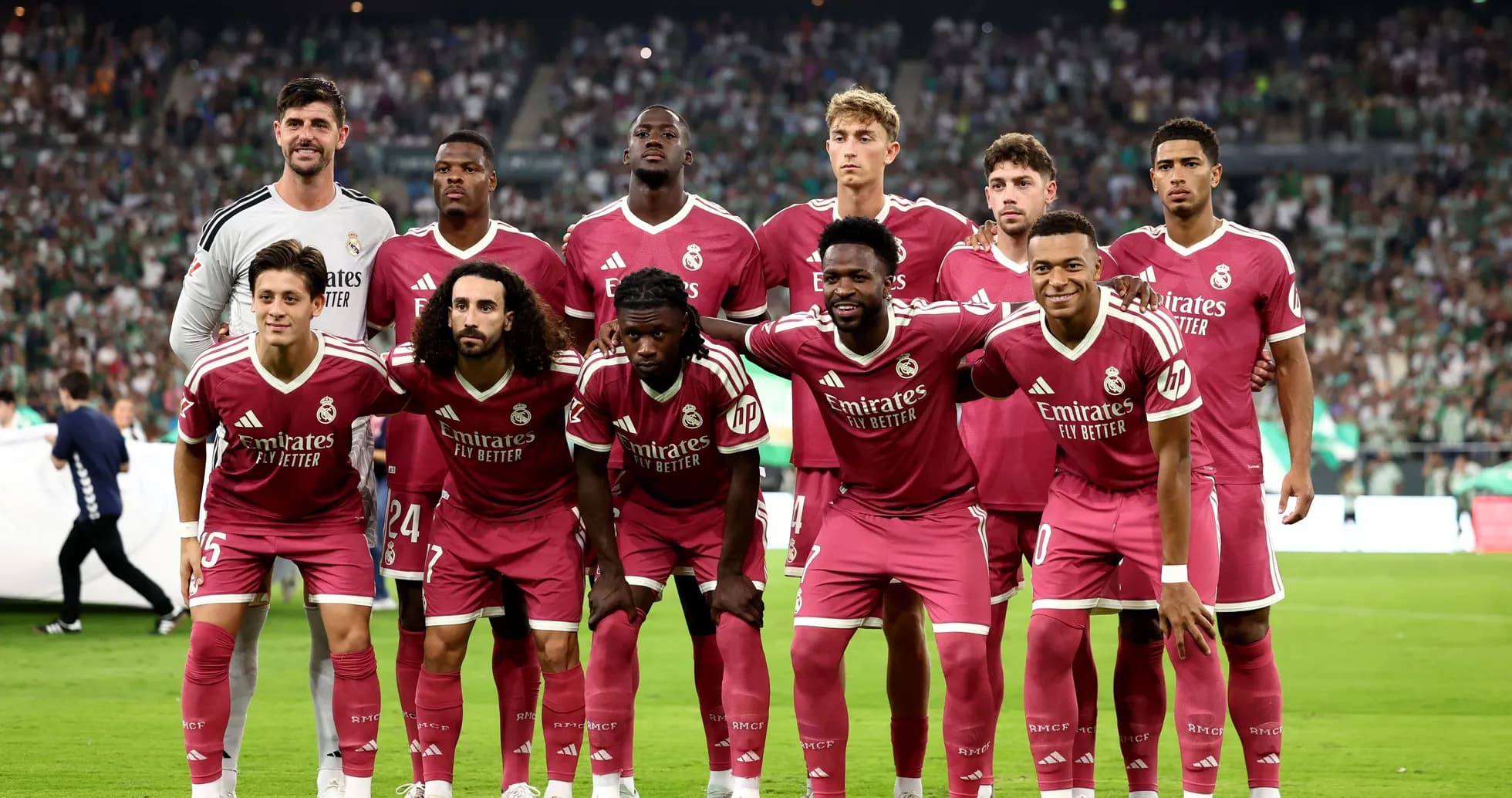 Real Madrid team posing for group photo before match