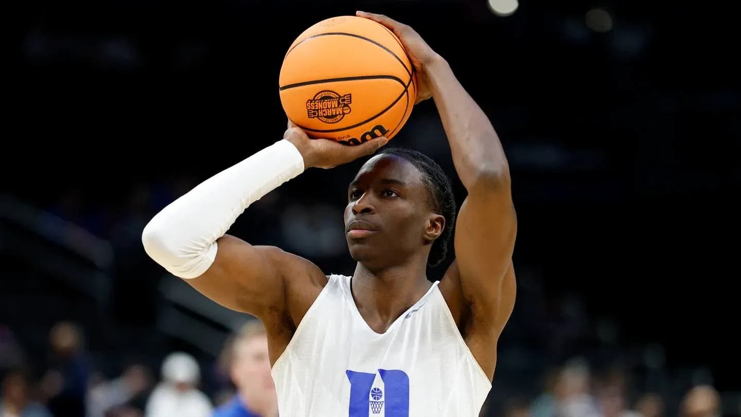 Player preparing to shoot basketball during practice