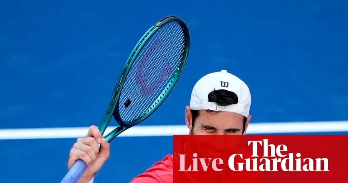 Tennis player preparing to serve on blue court