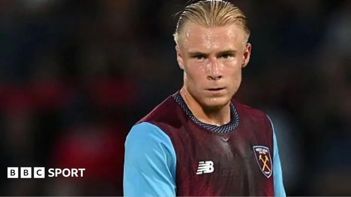 Player in West Ham kit during match preparation
