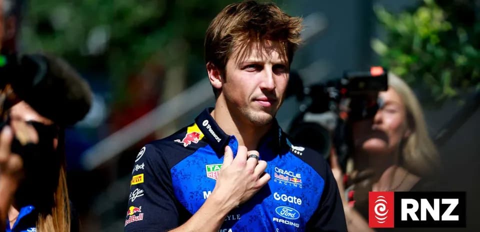Driver in team uniform during media event