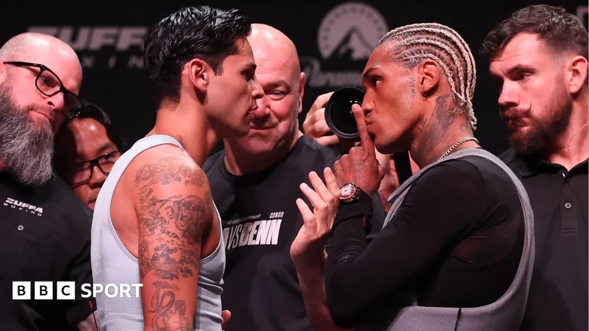 Two boxers face off during pre-fight event