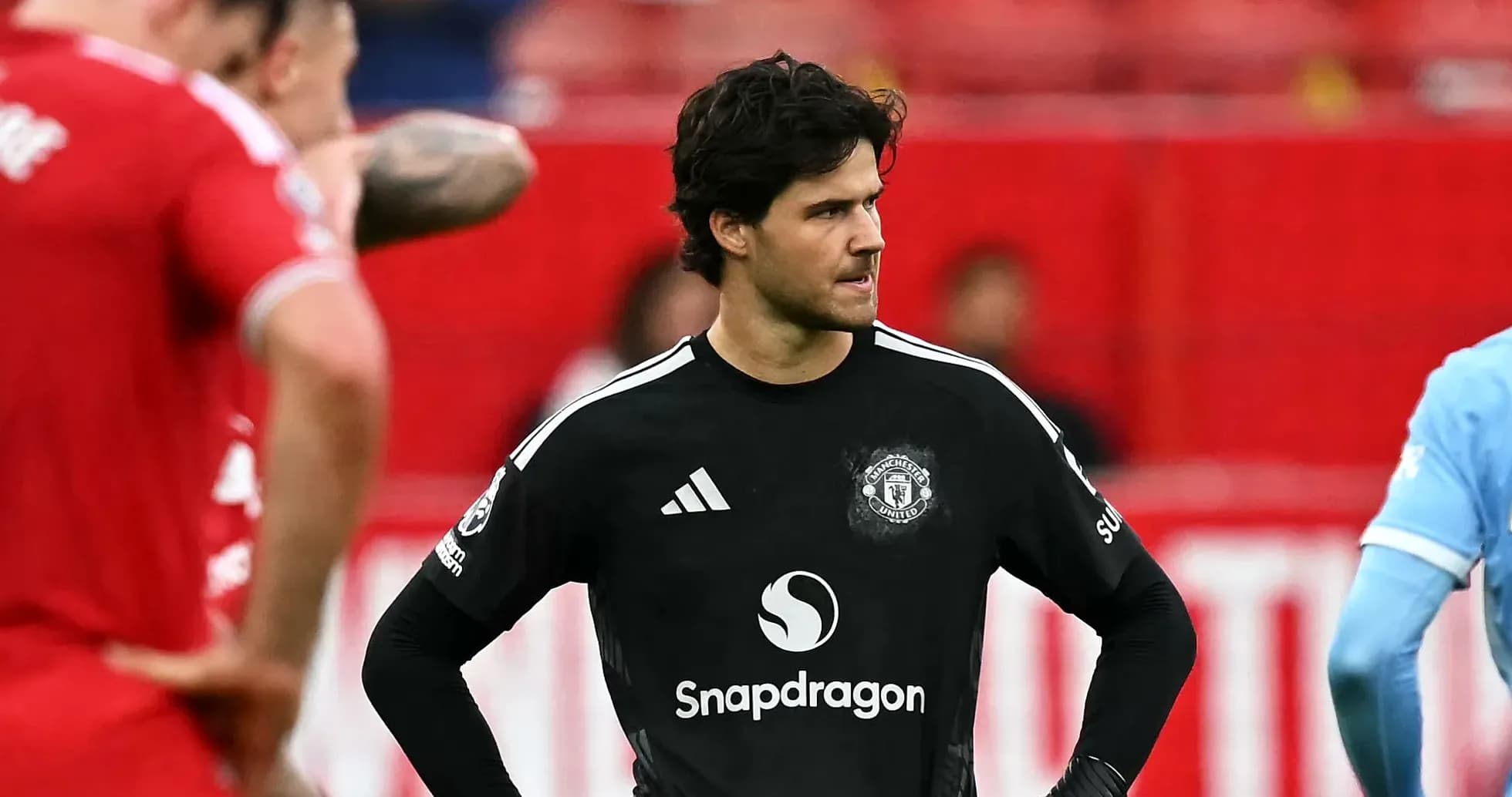 Goalkeeper in Manchester United kit during match