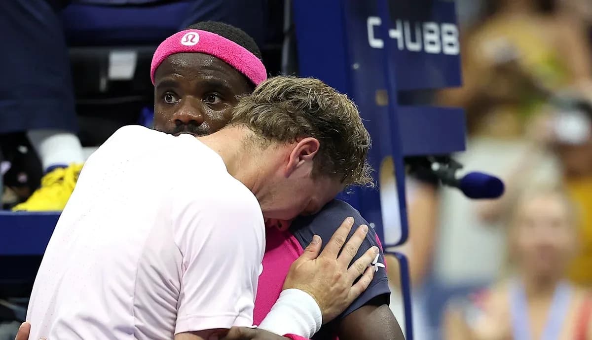 Players embracing during a tense moment on court