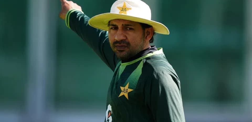 Cricketer gesturing during practice session outdoors