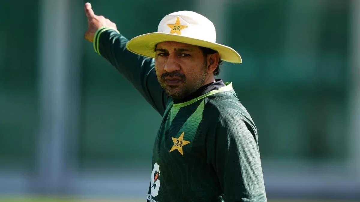 Cricketer gesturing during practice session outdoors
