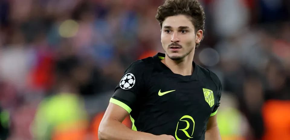 Player in black jersey during UEFA Champions League match