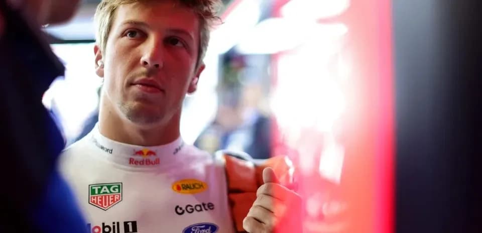 Driver preparing in the garage before race