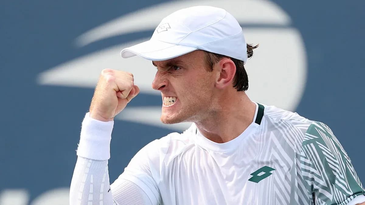 Tennis player celebrating with a clenched fist