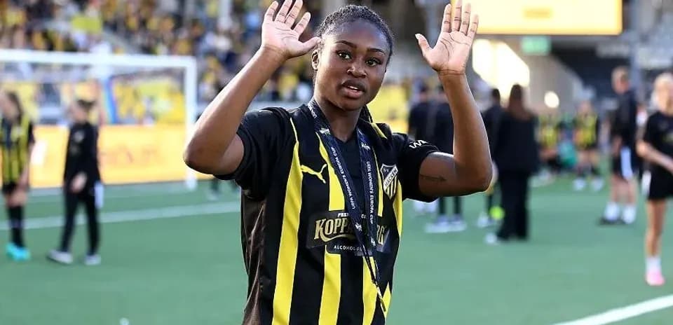 Player waving after winning the match on field