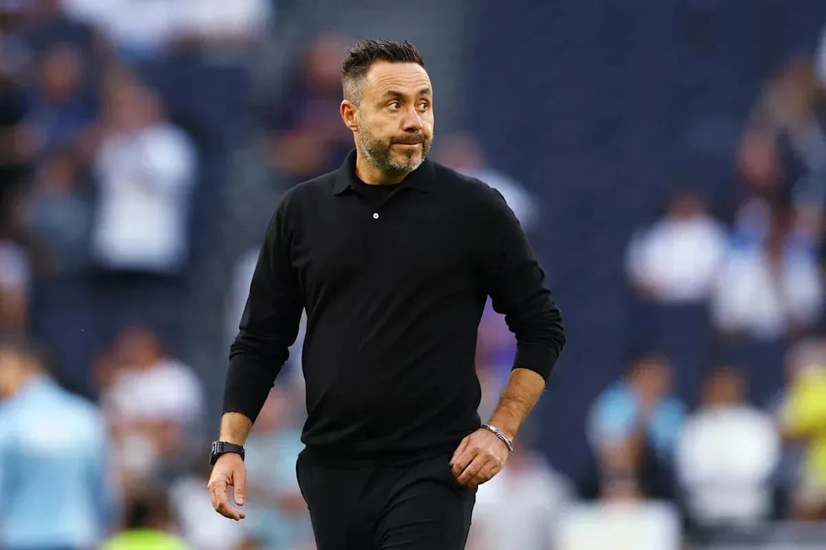 Coach walking on the sidelines during match