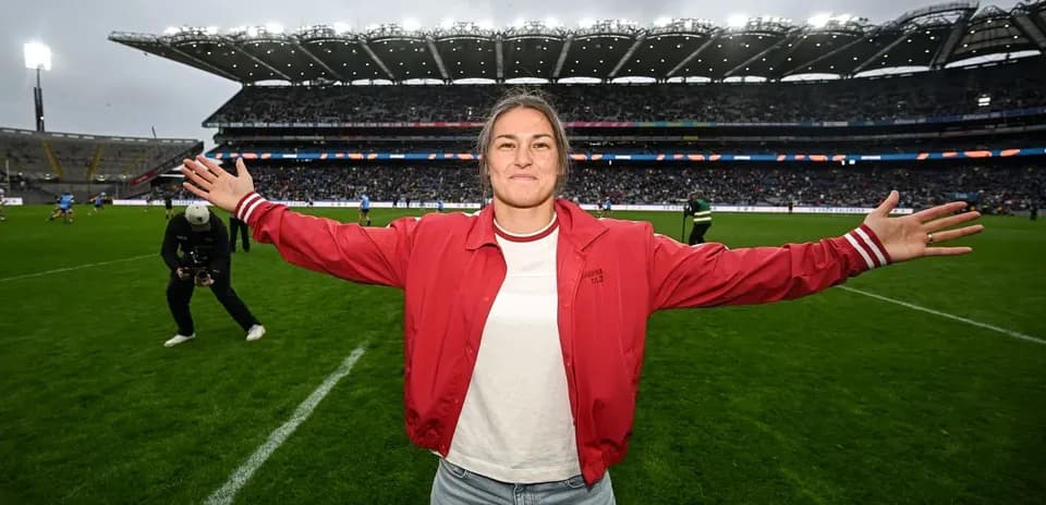 Person celebrating on the field at stadium