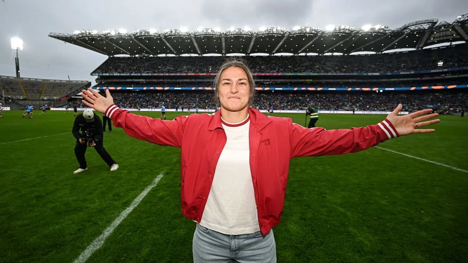 Person celebrating on the field at stadium