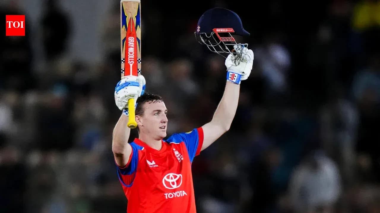 Batsman celebrating after scoring a century