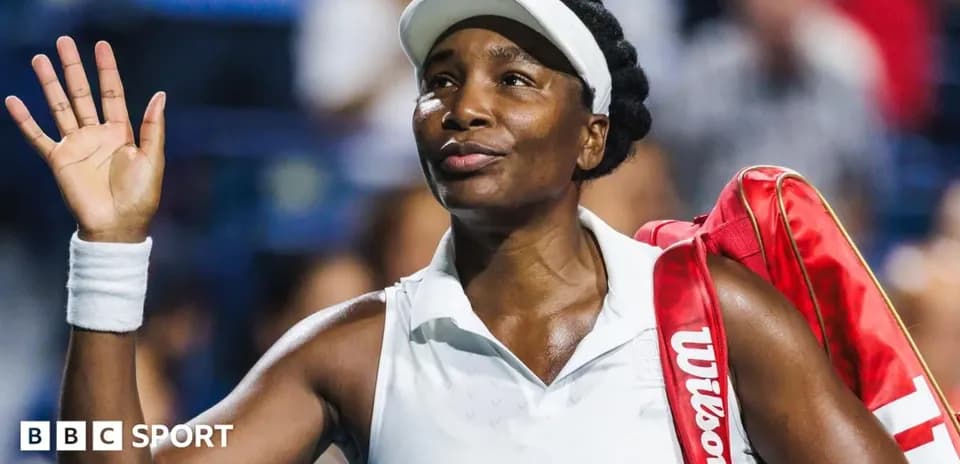 Tennis player waving after a match