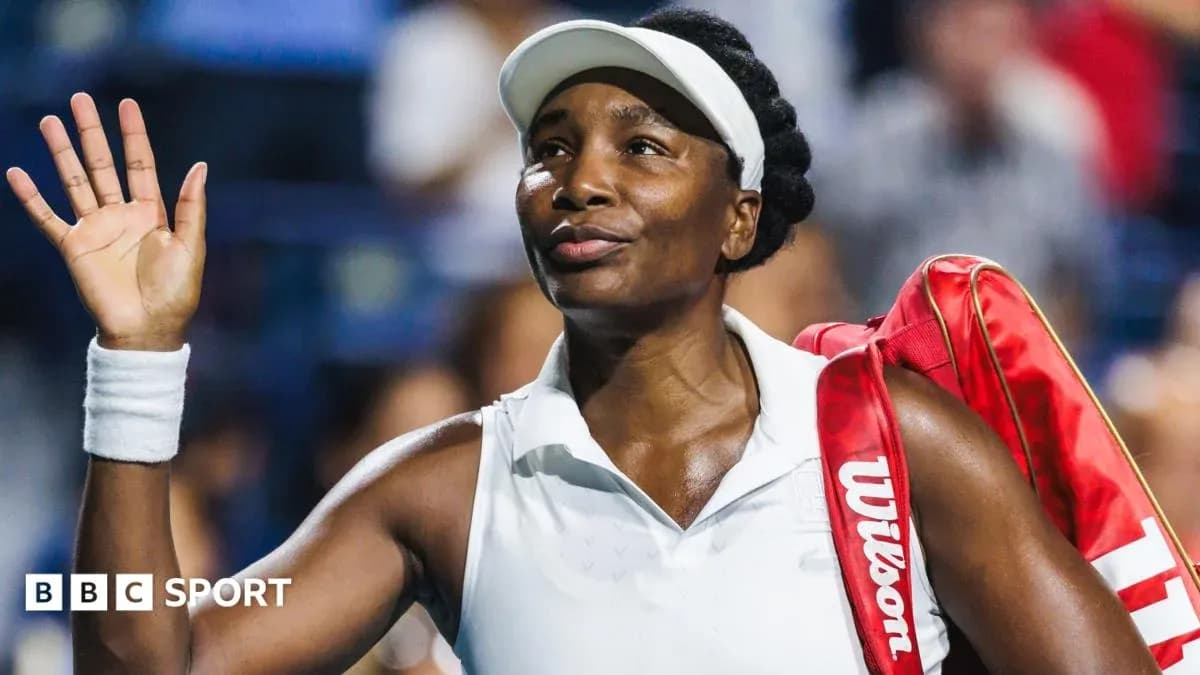 Tennis player waving after a match