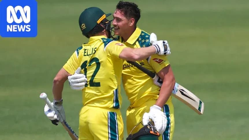 Two Australian cricketers celebrating after a run