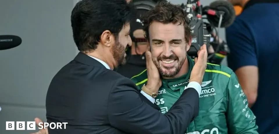 Two men interacting in a paddock area