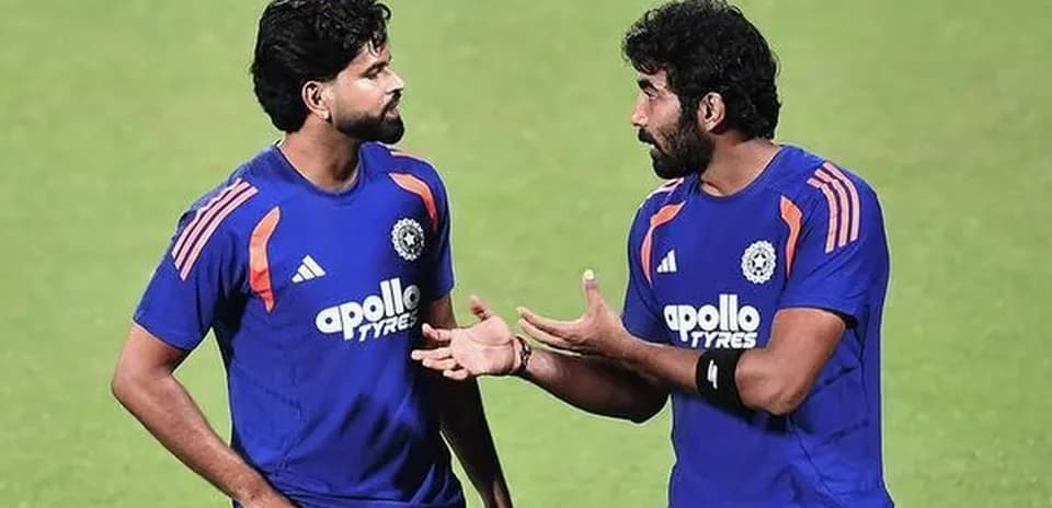 Two players discussing during cricket practice session