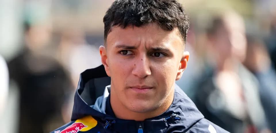 Driver in Red Bull jacket during event