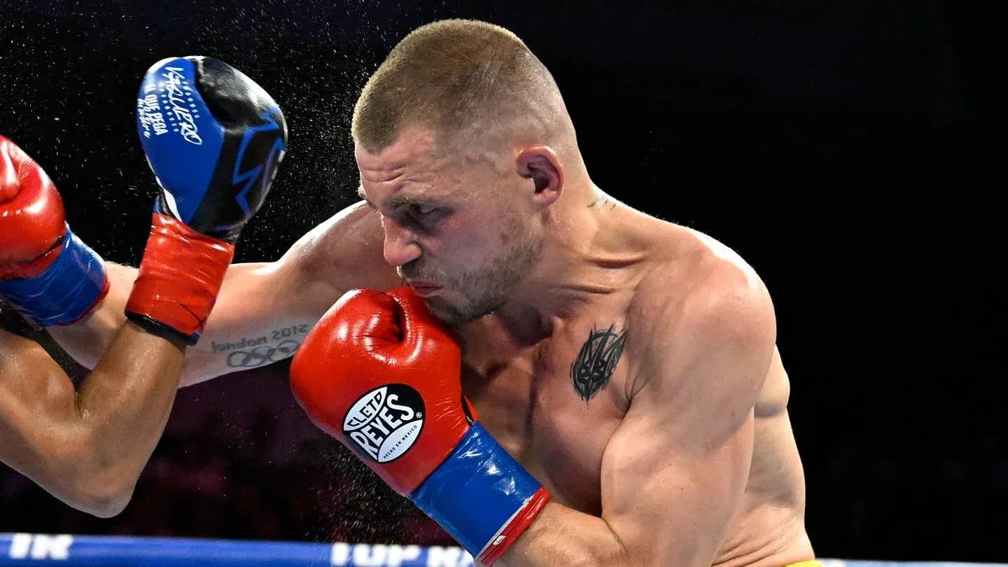Boxer throwing a punch during a match