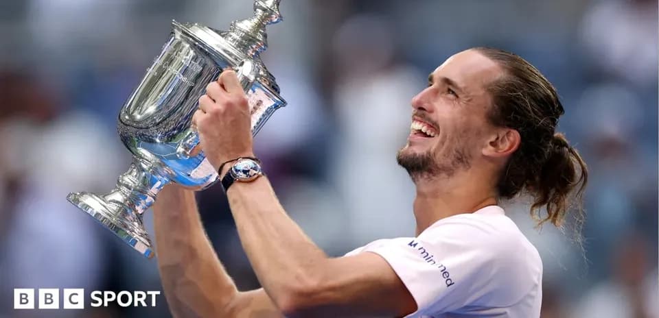 Player celebrating victory with trophy at US Open