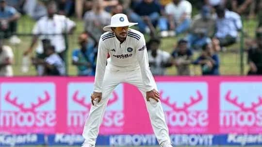 Cricketer fielding during a match in stadium