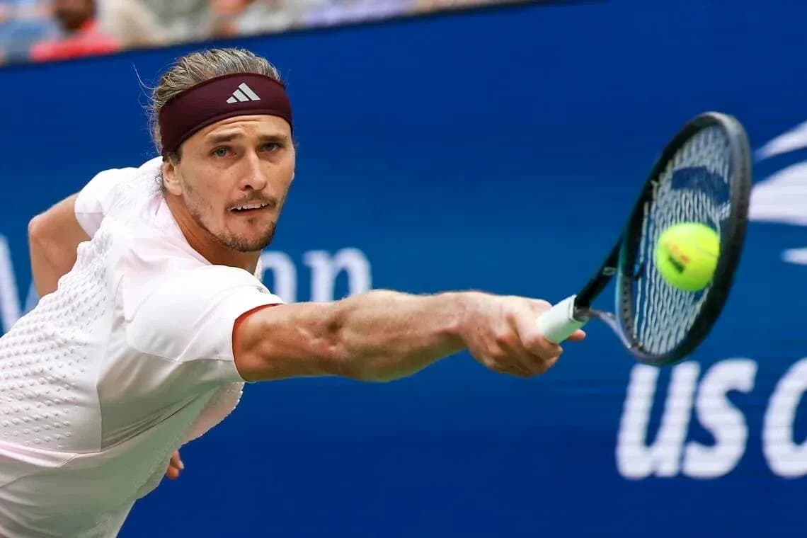 Player hitting a tennis ball during a match